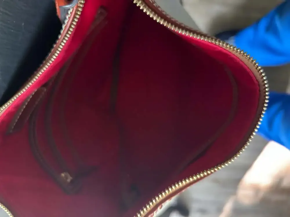Dooney and Bourke White Leather Hobo Bag with Brown Trim,